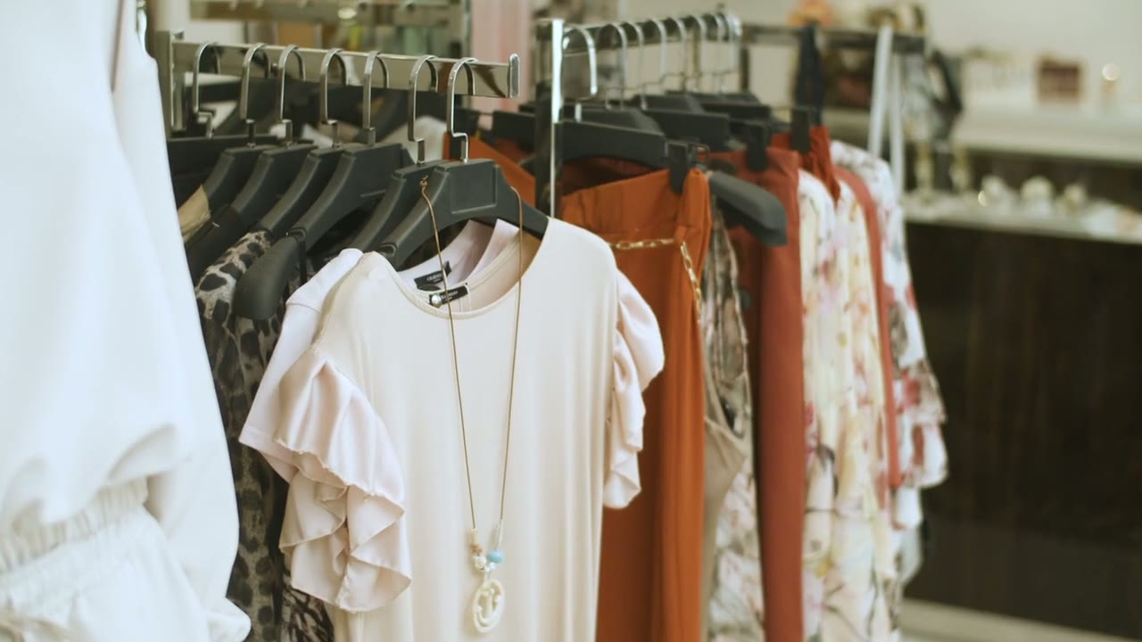 Clothes on rails in a fashion boutique