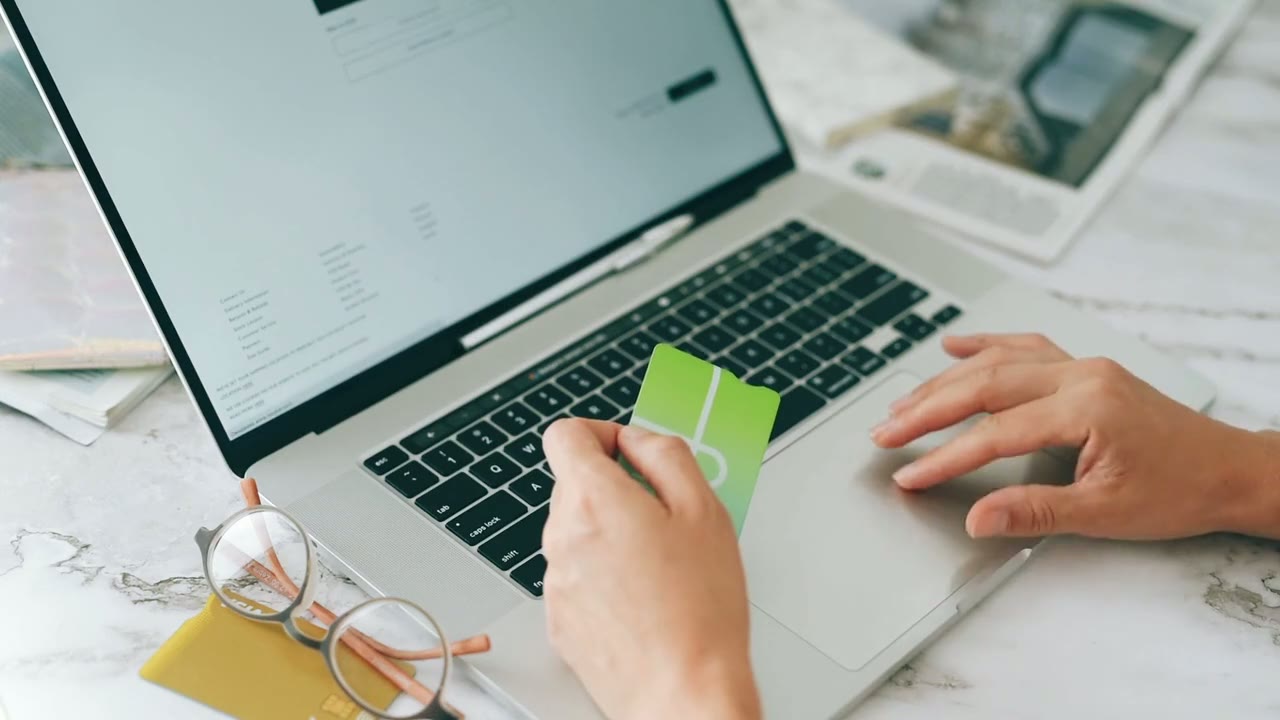 Person shopping online on a laptop