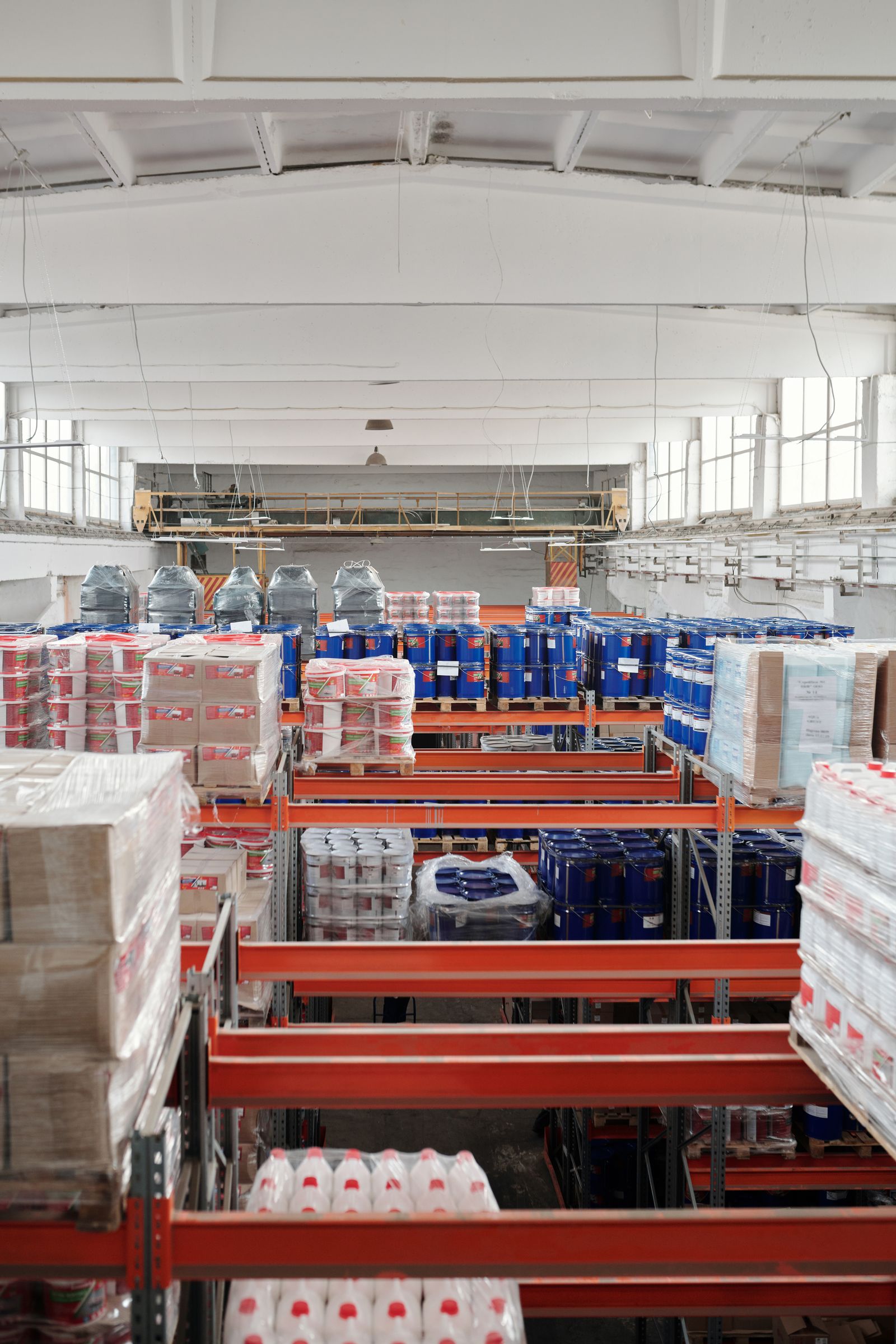 Bright warehouse with organised inventory and fulfilment lanes