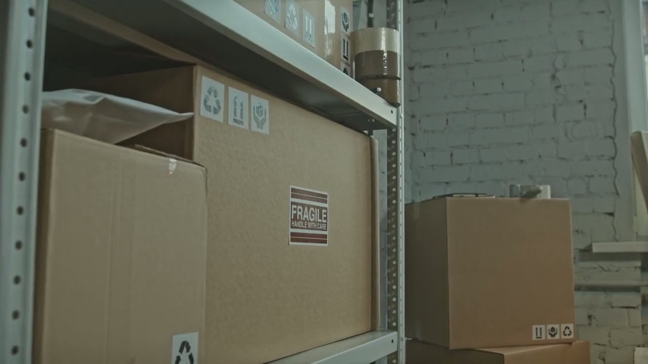 Parcels arranged in racks at a courier office