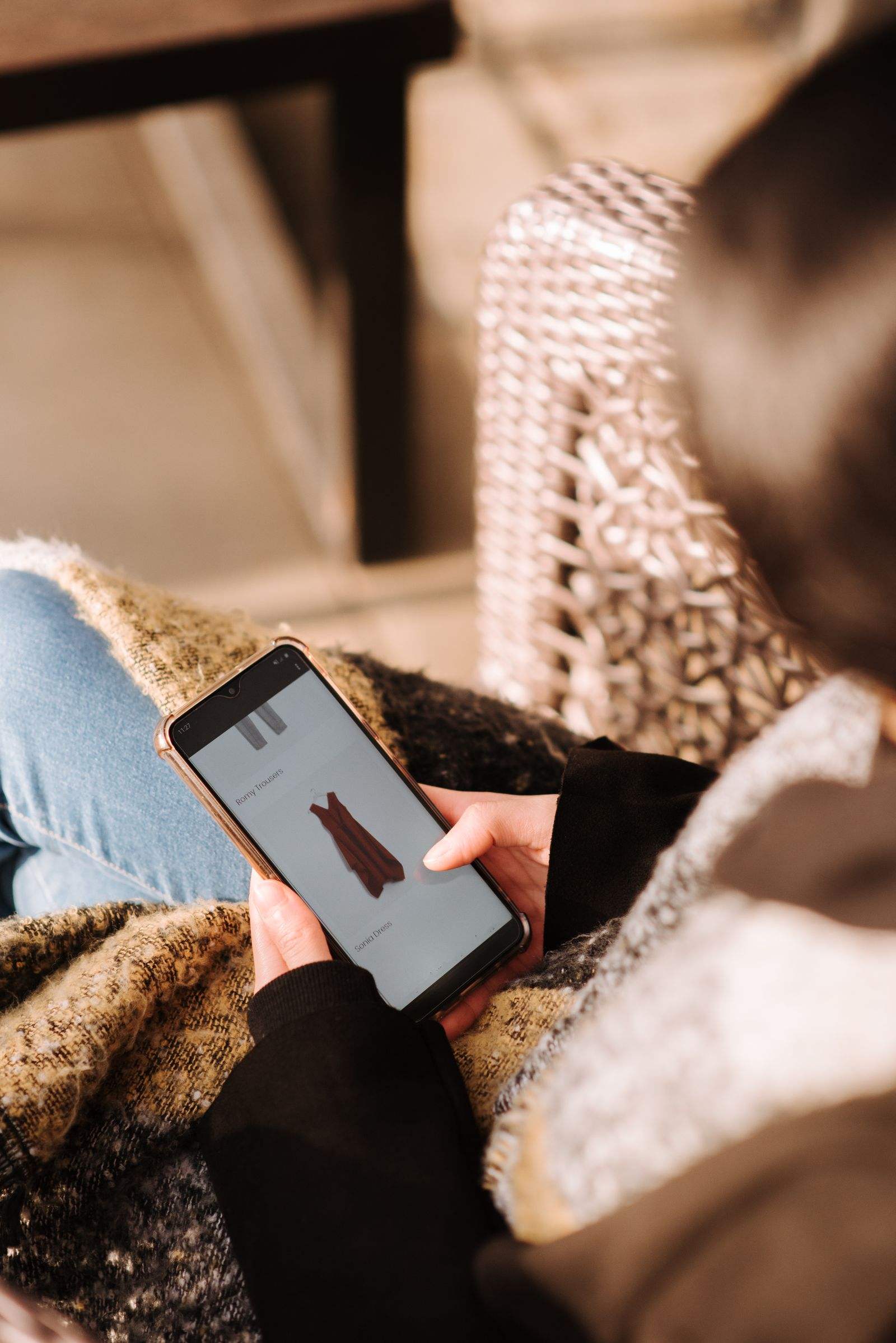 Shopper viewing a dress listing on a smartphone